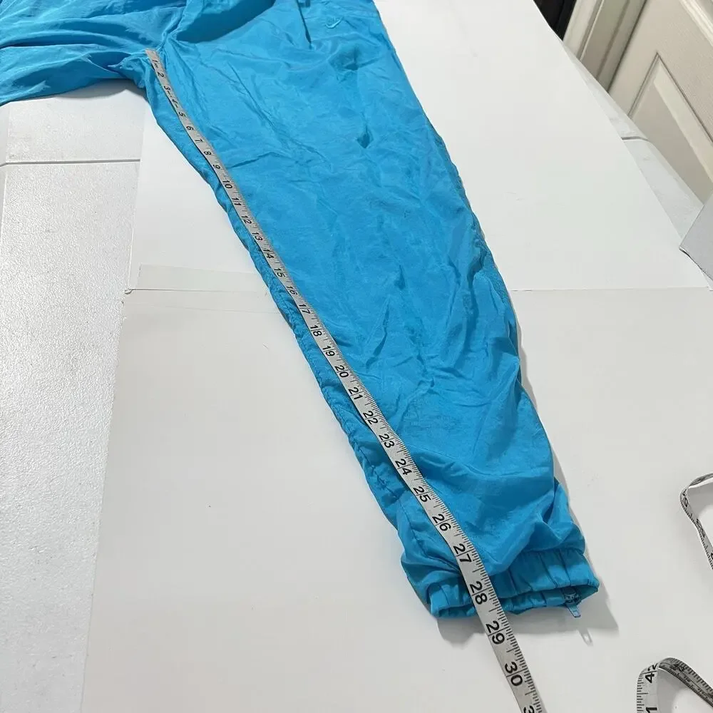 Vintage Nike Women’s Teal Nylon Windbreaker Track Pants Size L Lined 90’s
